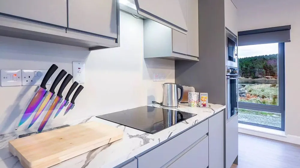 Oyster House's modern and inviting kitchen window overlooking Ballinakill Bay. wp-image-582