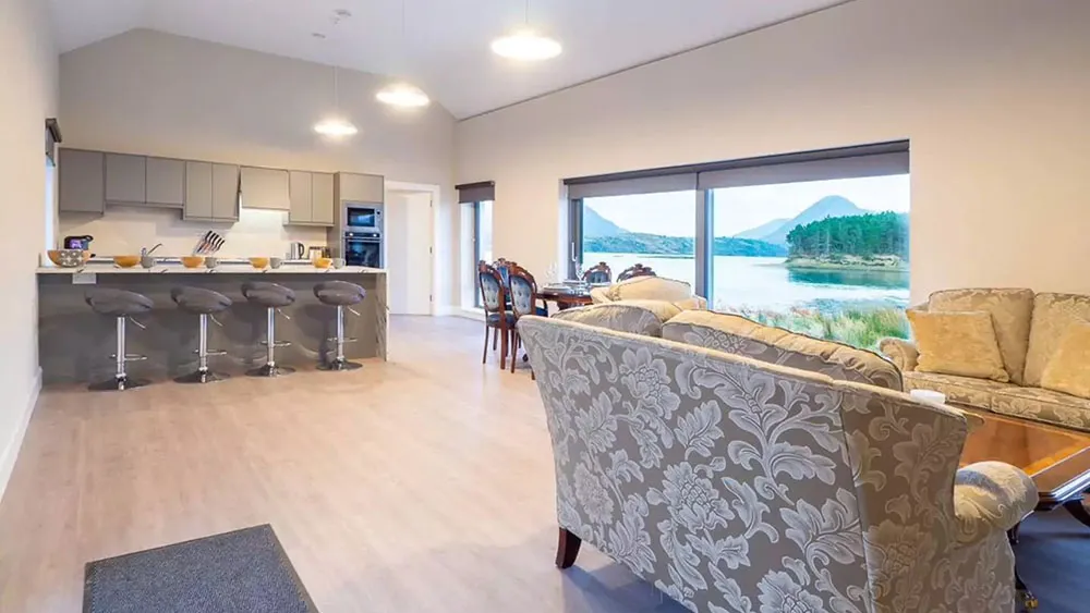 View of Ballinakill Bay from within Oyster House. Water and mountains are visible from window. wp-image-579